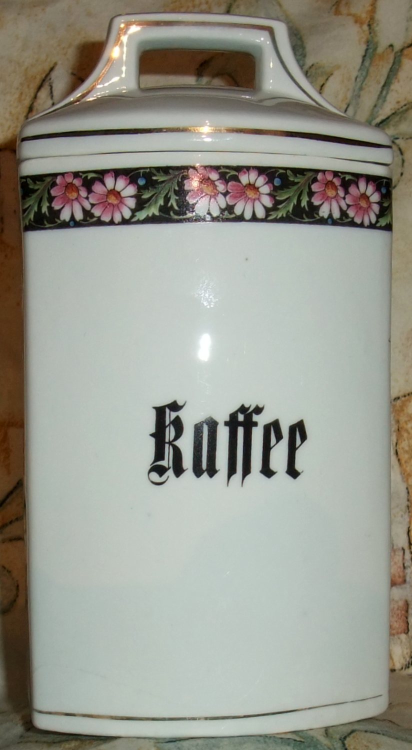 Porzellanene Vorratsdose mit Deckel mit Korbblüterborte und KAFFEE-Aufschrift